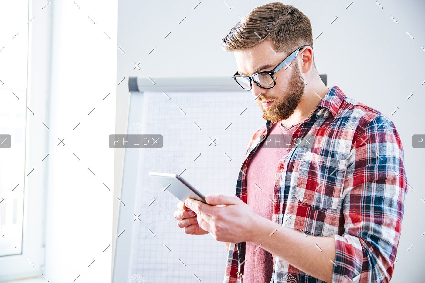 demo-attachment-176-handsome-serious-man-with-beard-standing-and-PBYSCKB