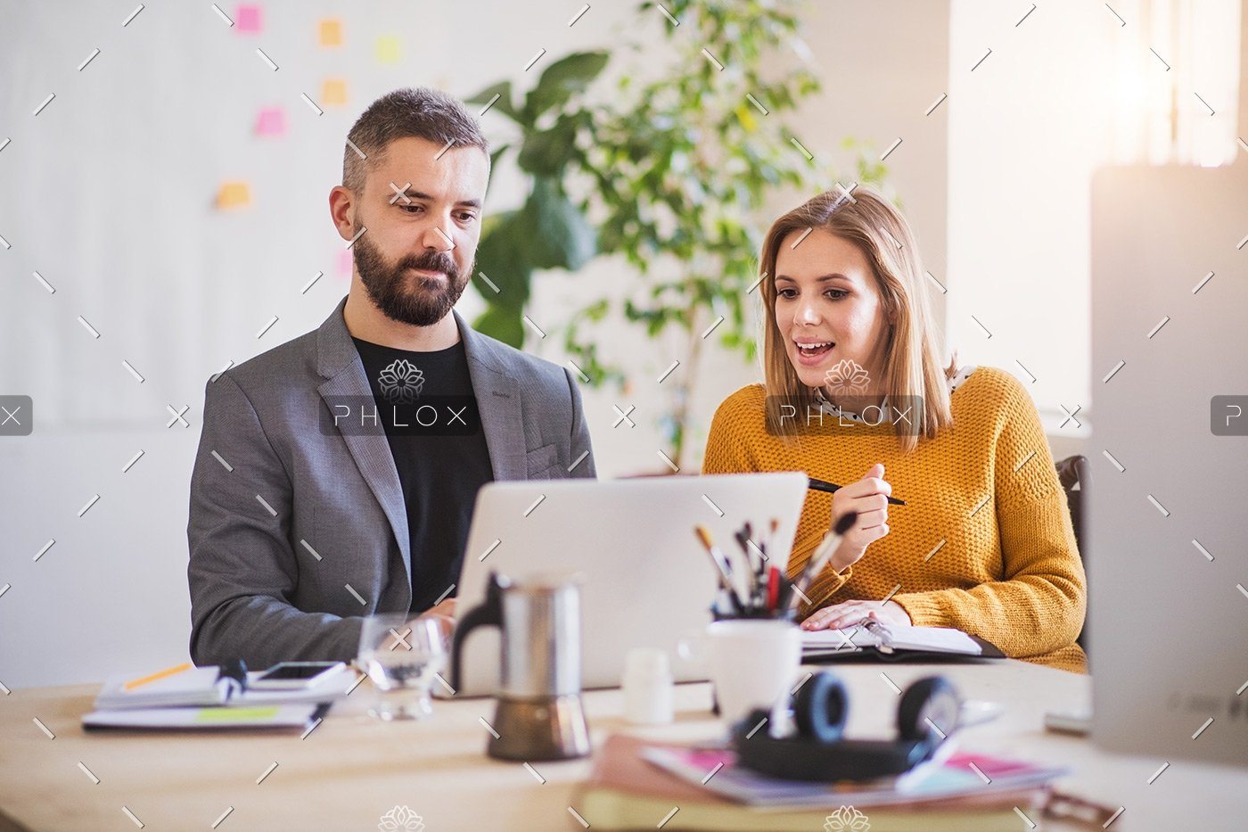 demo-attachment-172-two-business-people-with-wheelchair-in-the-office-P7XLSBC